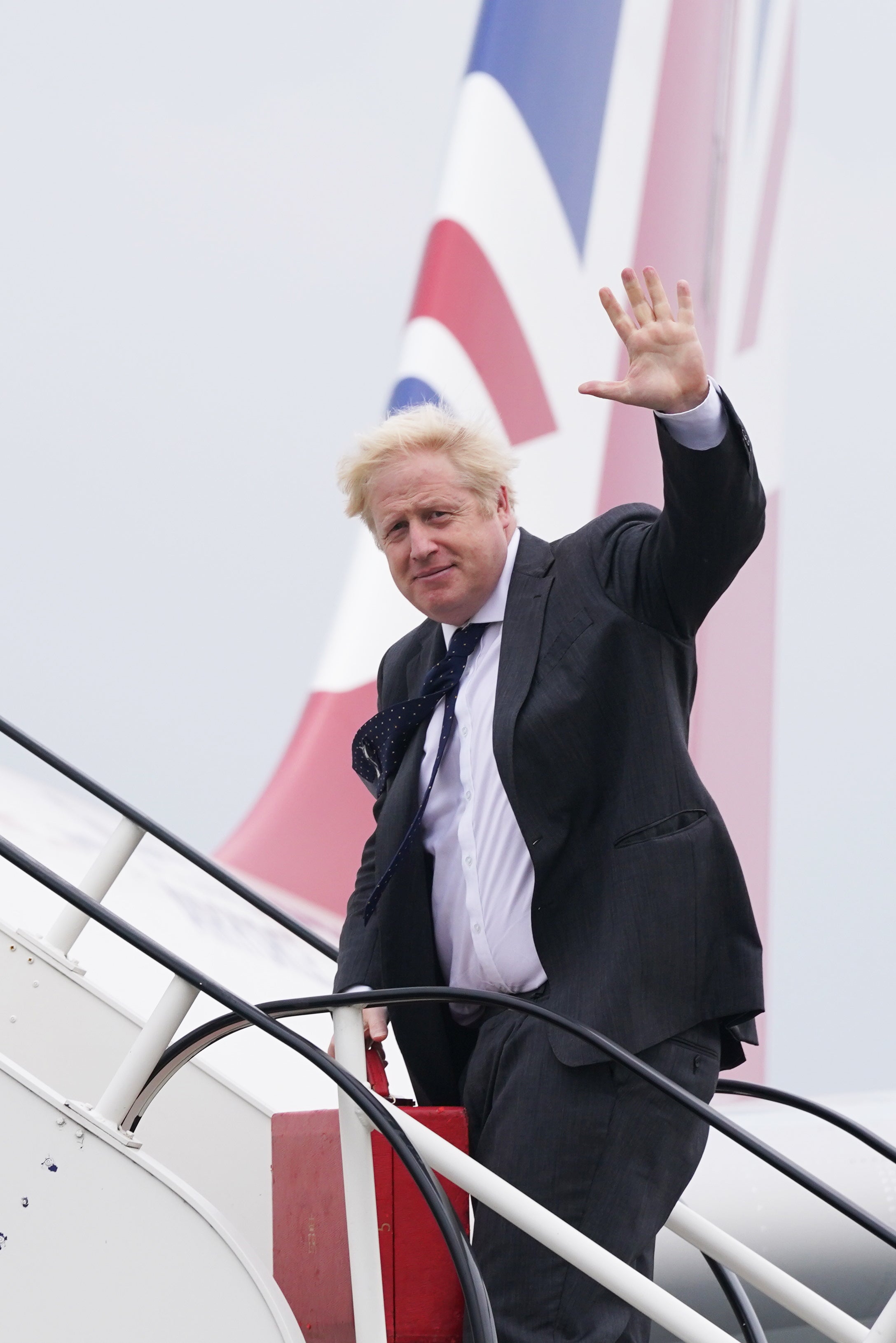 Prime Minister Boris Johnson boards RAF Voyager at Stansted Airport in 2021 (Stefan Rousseau/PA)