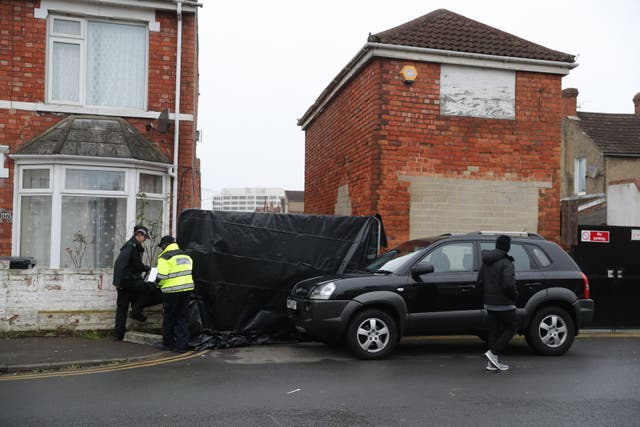 A police barrier at the home of double murderer Christopher Halliwell (Andrew Matthews/PA)