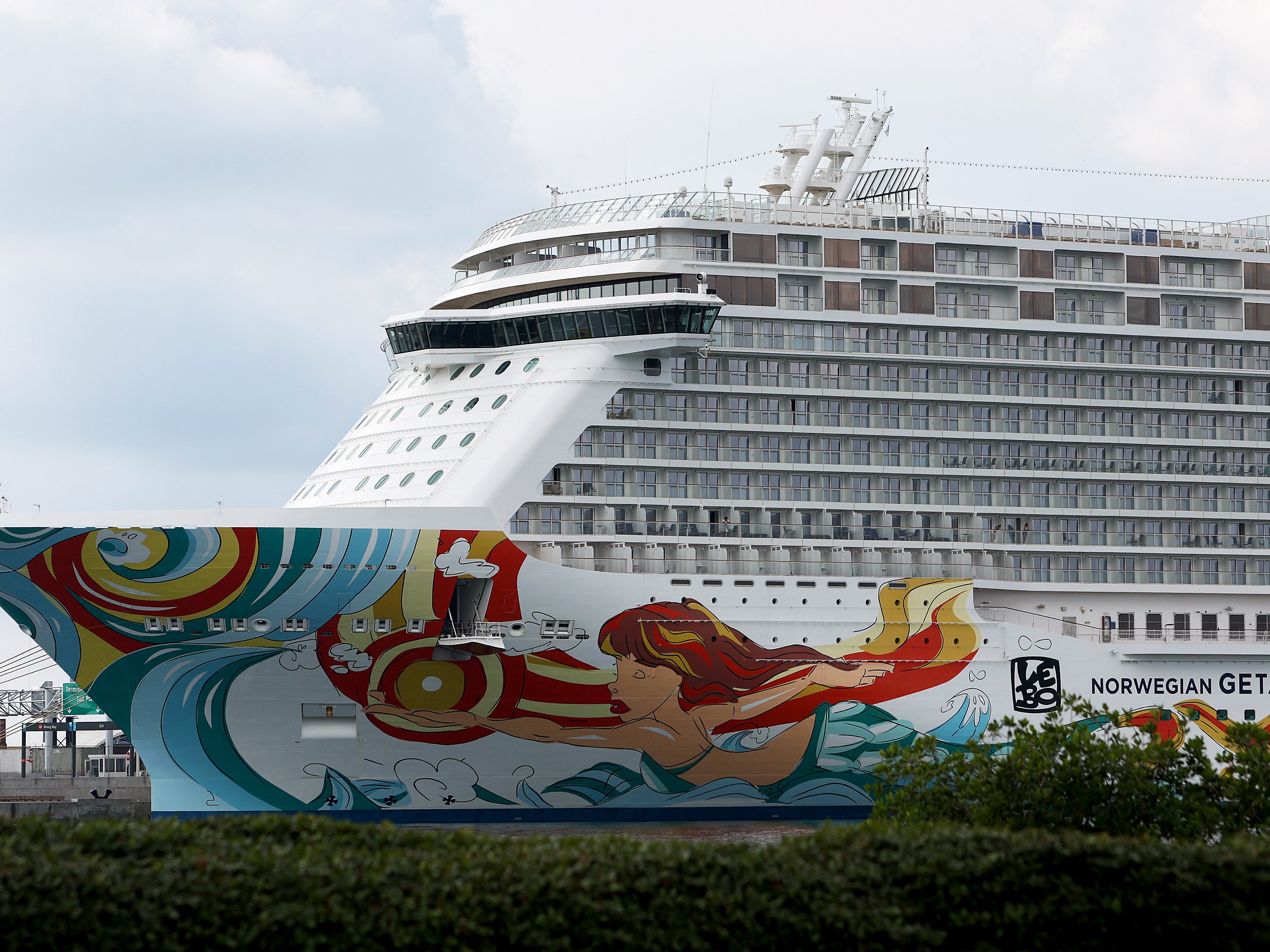 Two Norwegian Cruise Line passengers have been accused of bringing more than 100 bags of marijuana on board