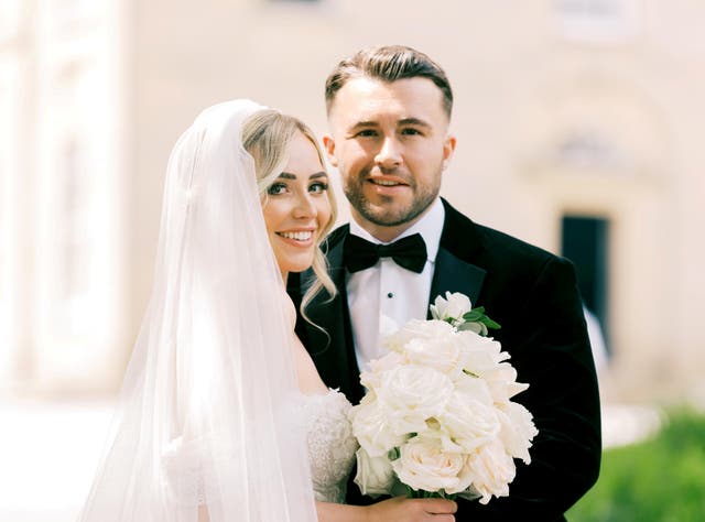 <p>Courtney Wilson-Calder and her husband, Liam Calder, on their wedding day</p>