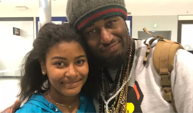 <p>Jermaine Petit, right, with daughter Ashlyn, was critically injured after being shot three times in the back by LAPD officers</p>