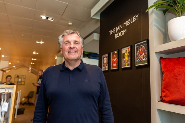 Jan Molby at the newly unveiled room (John Lewis Partnership/PA)
