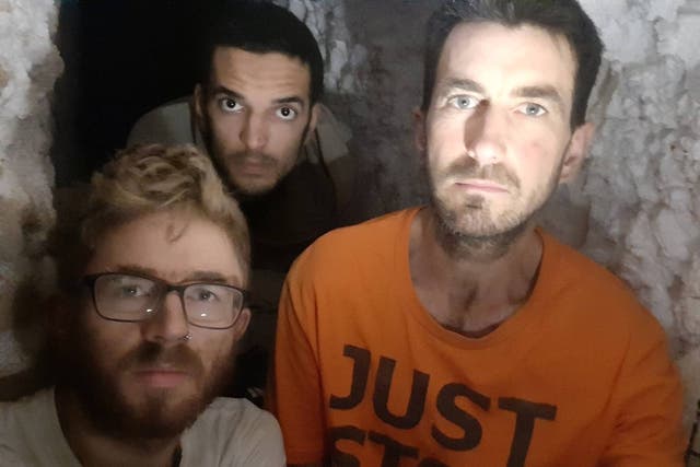 From left: Joe Howlett, 32, Xavier Gonzalez-Trimmer, 21, and Samuel Johnson, 39, occupy a tunnel dug beneath St Clements Way in Grays, Essex (Samuel Johnson/PA)