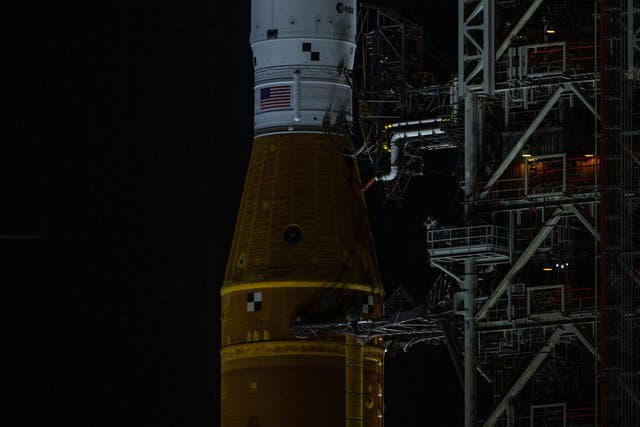 <p>Nasa’s Artemis I mission — the Space Launch System rocket and Orion spacecraft — on the launch pad at Kennedy Space Center beneath a full Moon. </p>