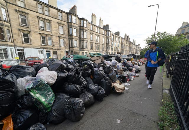 Overflowing bins on the streets of Edinburgh (Andrew Milligan/PA)