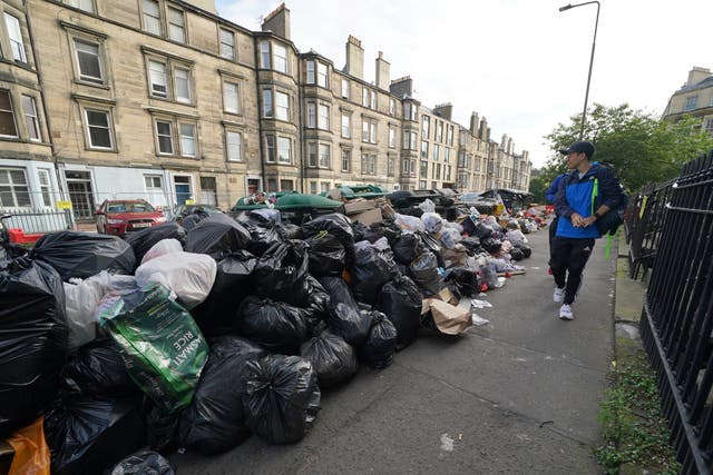 Overflowing bins on the streets of Edinburgh (Andrew Milligan/PA)