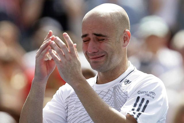 Andre Agassi was in tears following his retirement at the US Open in 2006 (PA Archive)