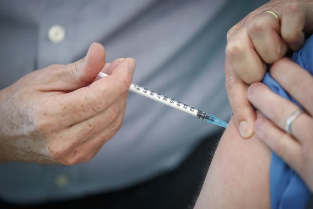 A Pfizer/BioNTech vaccine being administered (PA)
