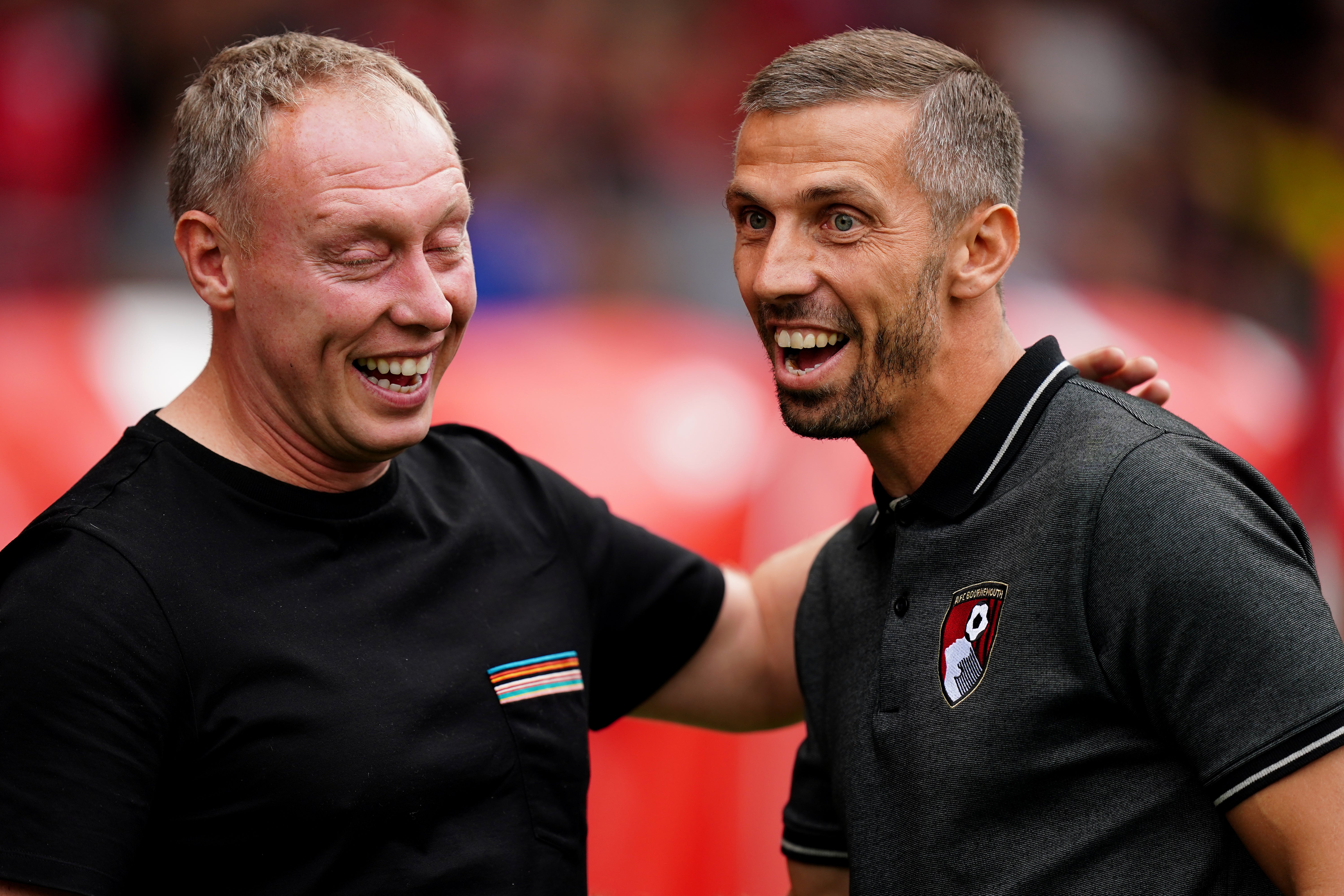 Bournemouth interim head coach Gary O’Neil, right, and Nottingham Forest manager Steve Cooper share a joke (Mike Egerton/PA)