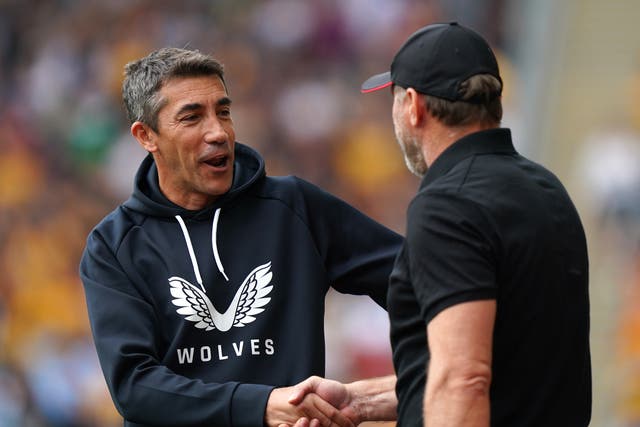 Wolves boss Bruno Lage, left, is the happier manager after his side’s first league win of the season against Southampton (Tim Goode/PA)