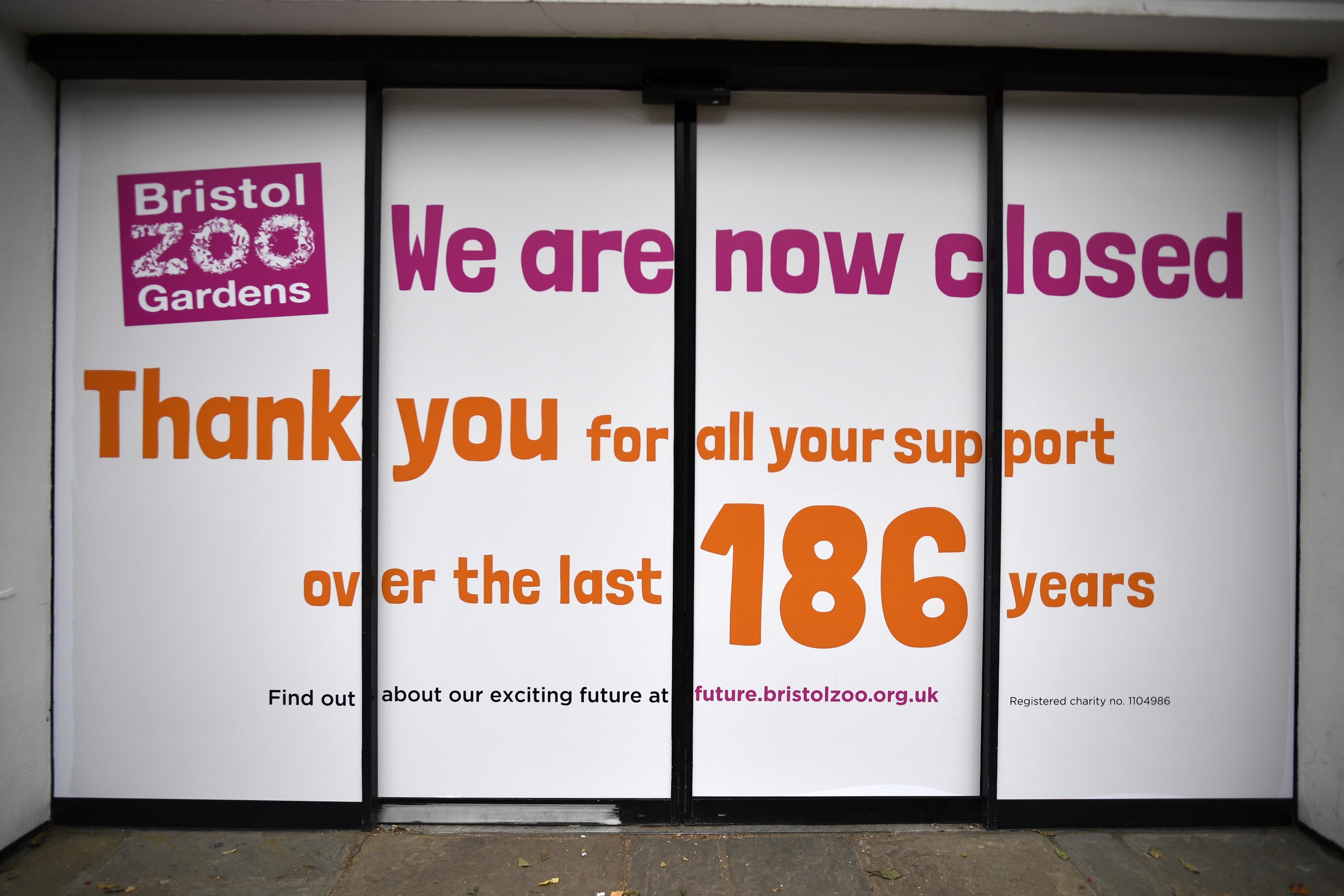A sign on the doors at Bristol Zoo Gardens after it closed for the final time (PA)