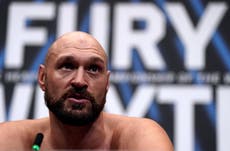 Tyson Fury makes ring return… as heavyweight champ floors WWE star in Cardiff