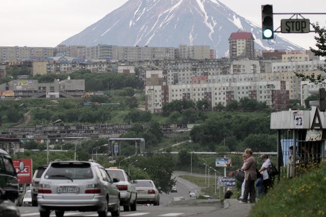 <p>File photo shows a view of Petropavlovsk-Kamchatsky city with Klyuchevskaya Sopka mountain on the background</p>