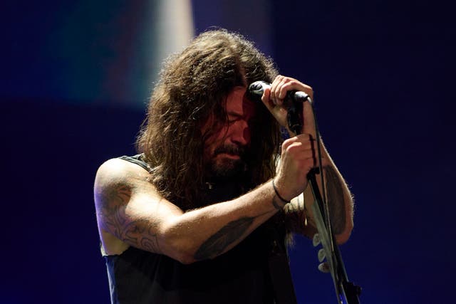 <p>Dave Grohl arrived on stage with the Foo Fighters to a deafening roar </p>