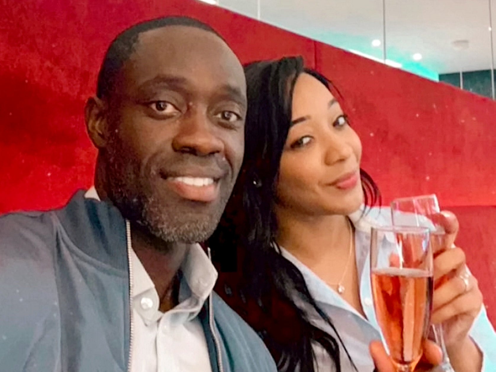 Nana Osei-Adjei and Tremaine Osei-Adjei in Heathrow flying to Antigua for their honeymoon - the exact spot where they met