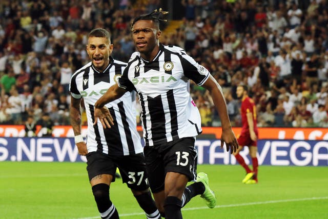 Destiny Udogie celebrates his goal in Udinese’s 4-0 victory over Roma (Andrea Bressanutti/AP)