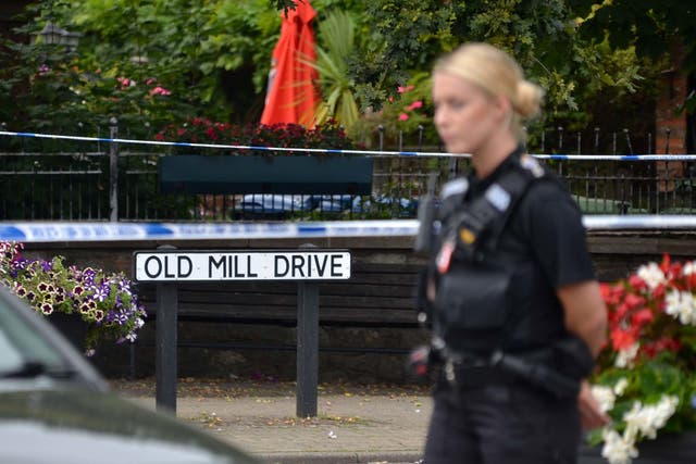 Police near the scene in Storrington, West Sussex (Clive Gee/PA)