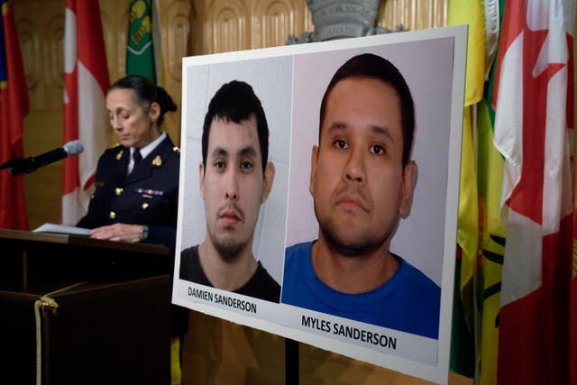 <p>Assistant Commissioner Rhonda Blackmore speaks next to images of Damien Sanderson and Myles Sanderson during a press conference at the Royal Canadian Mounted Police headquarters in Regina, Saskatchewan</p>