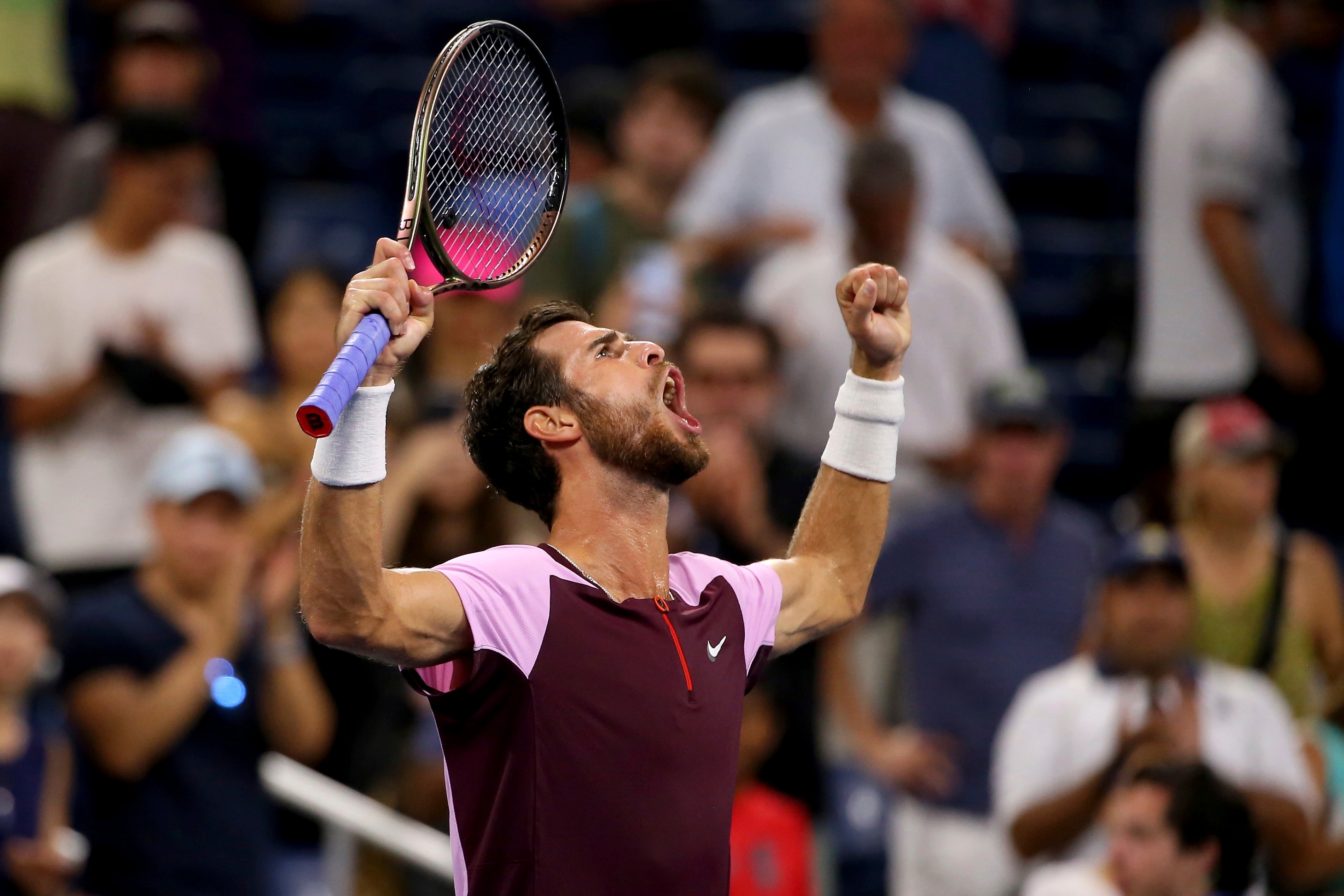 Karen Khachanov celebrates his five-set win against Pablo Carreno Busta (Andres Kudacki/AP)