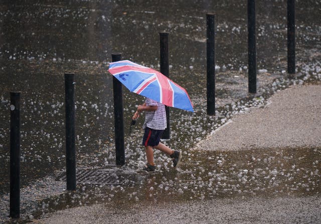 <p>Several flood alerts remain in place on Monday after rain, thunder and lightning swept across parts of the UK overnight (Yui Mok/PA)</p>
