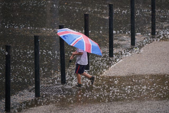 <p>Several flood alerts remain in place on Monday after rain, thunder and lightning swept across parts of the UK overnight (Yui Mok/PA)</p>