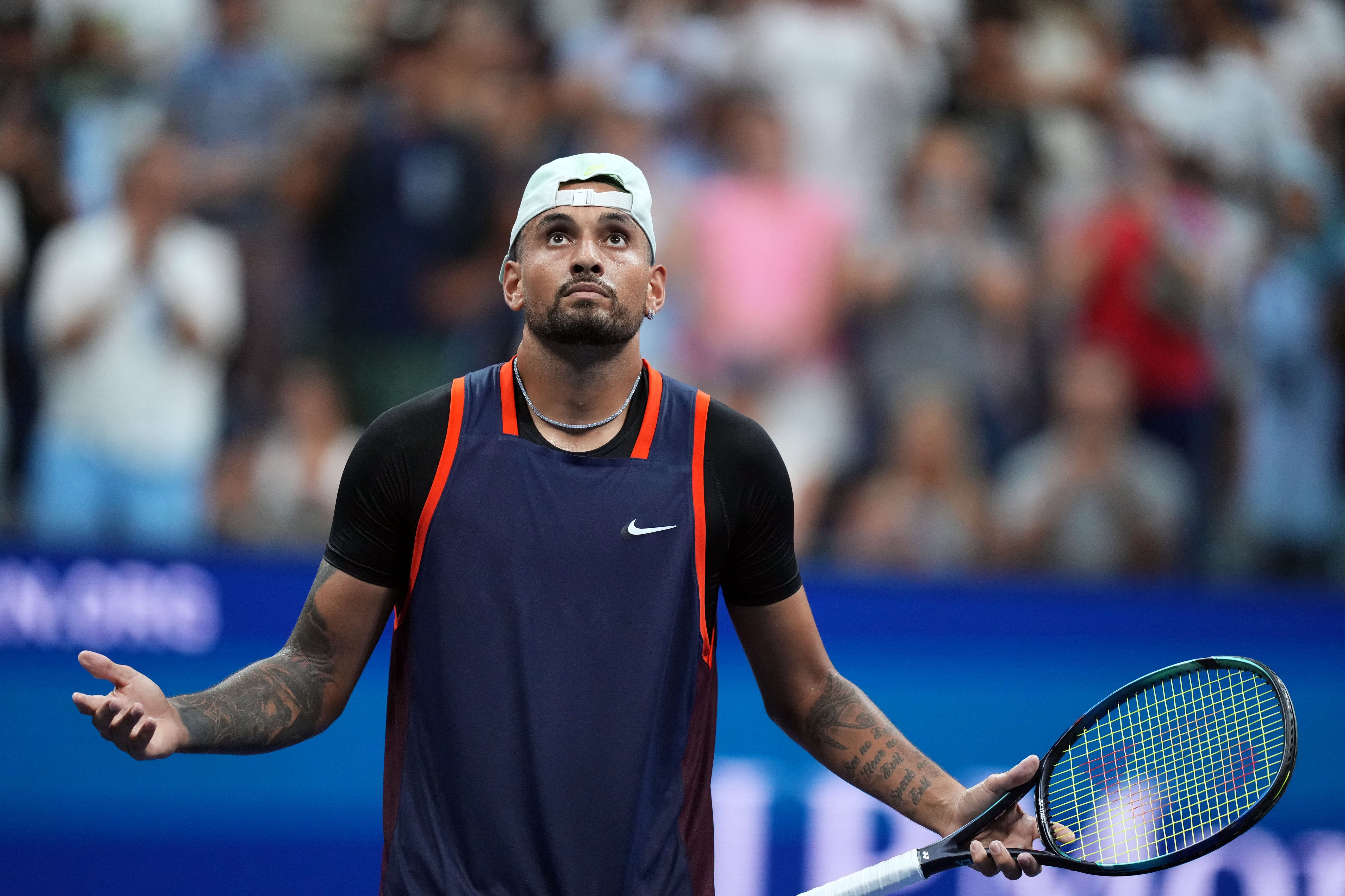 Nick Kyrgios in action against Daniil Medvedev