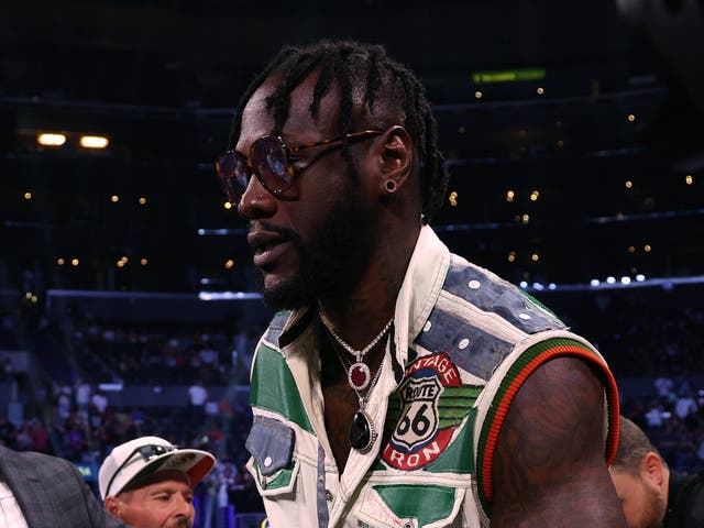 <p>Deontay Wilder enters the ring after Andy Ruiz Jr’s win against Luis Ortiz</p>