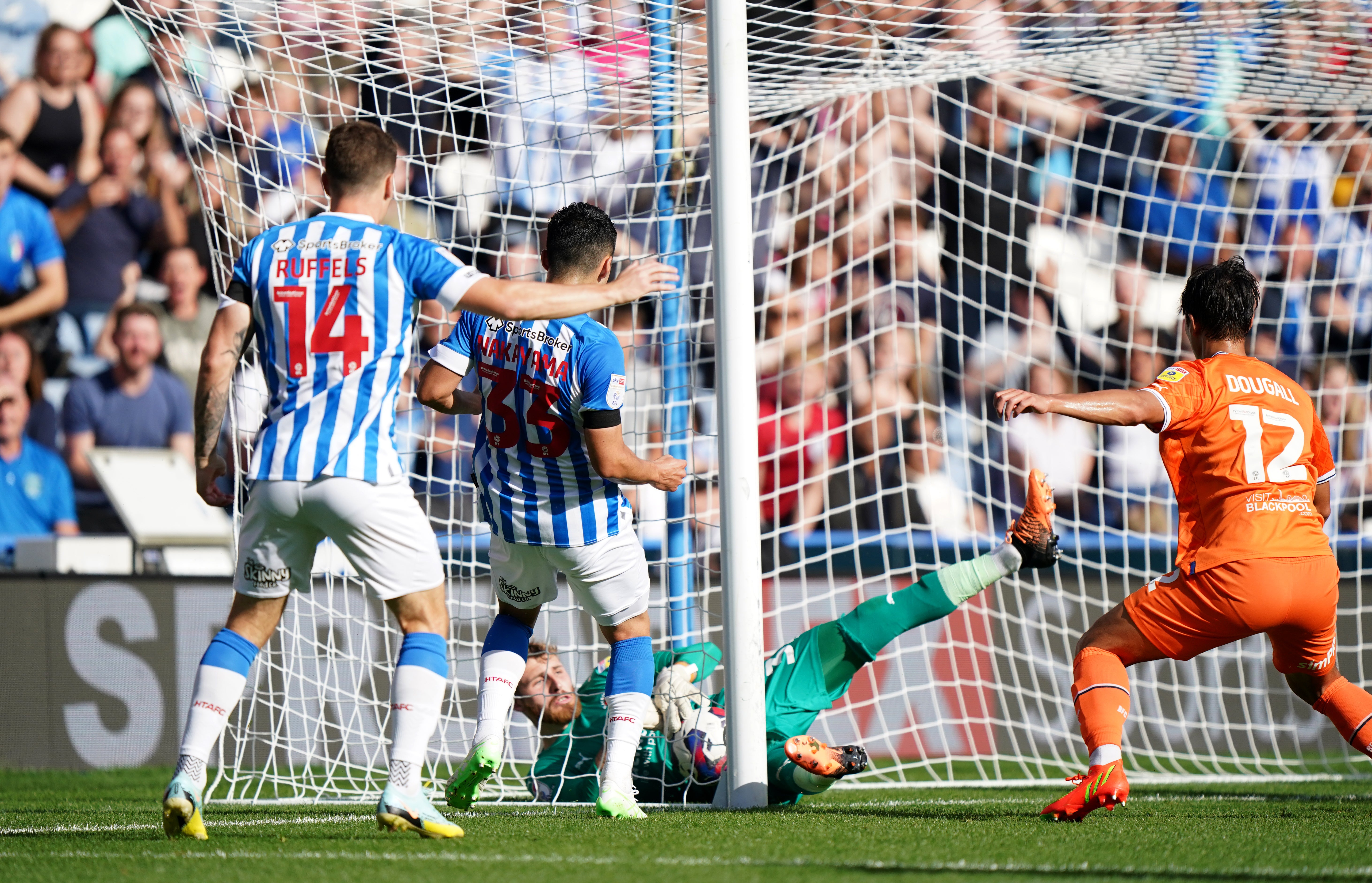 Huddersfield’s Yuta Nakayama was denied an equaliser when goal-line technology failed to detect his effort against Blackpool had crossed the line (PA)