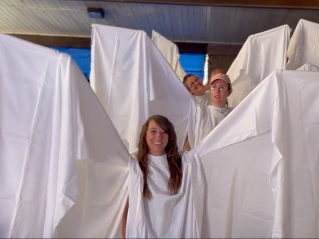 <p>LGBT+ students were protected by people wearing ‘angel wings’ in Utah on Saturday</p>