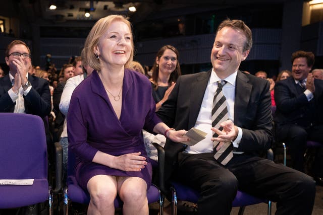 Liz Truss with her husband Hugh O’Leary at the Queen Elizabeth II Centre in London as it was announced Liz Truss is the new Conservative Party leader (Stefan Rousseau/PA)