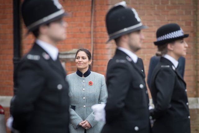 Home Secretary Priti Patel inspects new police recruits at a passing out parade at Essex Police HQ (PA)