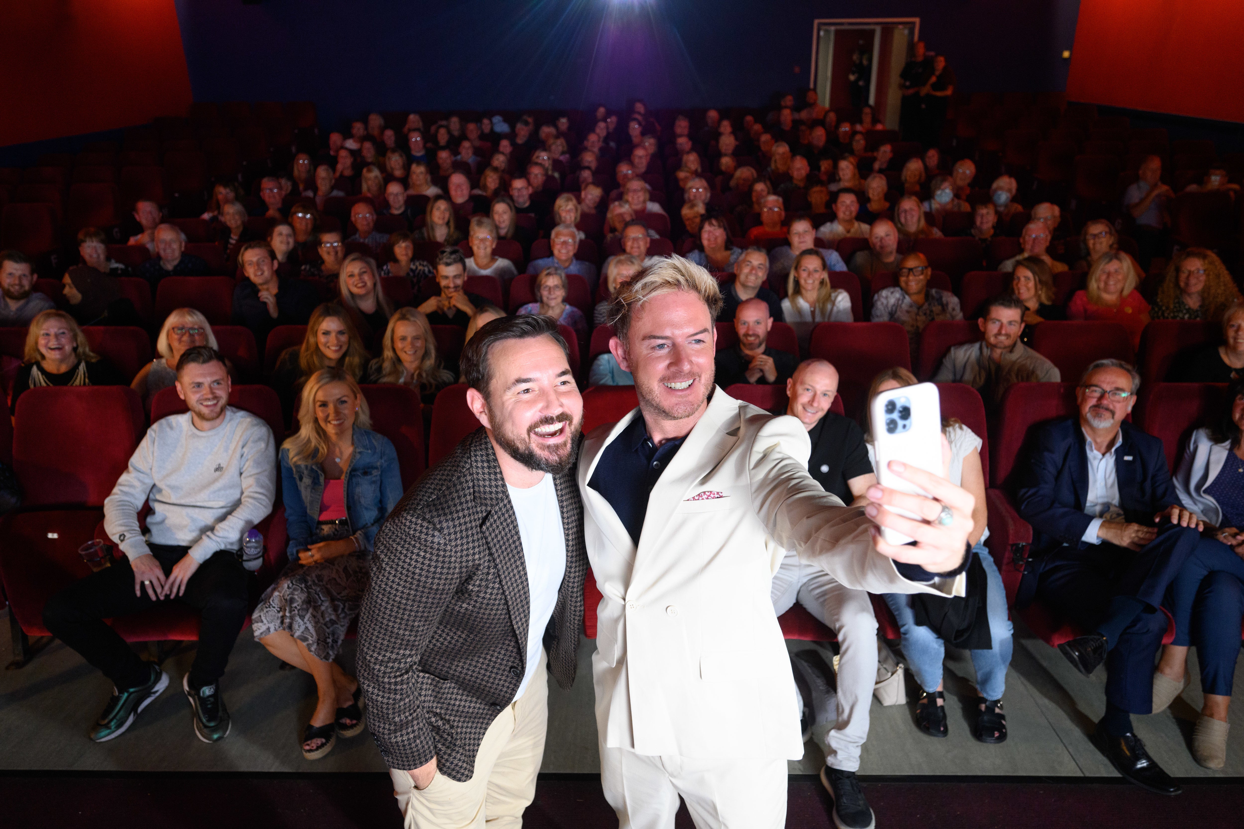 Martin Compston (left) and Phil MacHugh at the Waterfront Cinema in Greenock ahead of the preview of their new series, Martin Compston’s Scottish Fling (PA)