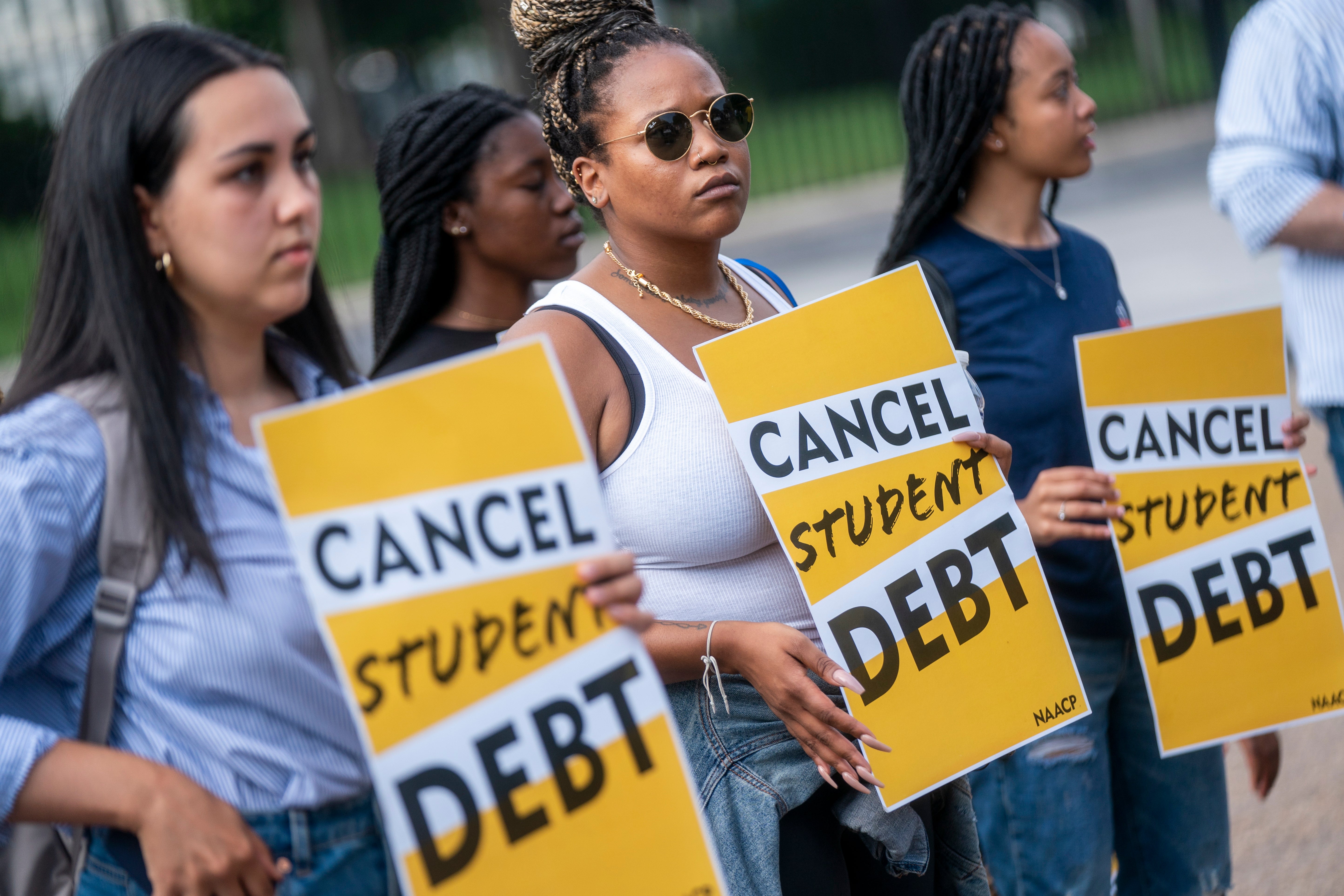 Student loan debt advocates rally in Washington DC following the Biden administration’s plan to cancel some federal student loan debt on 25 August
