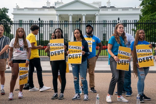 <p>Student loan debt advocates rally outside the White House on 24 August.</p>