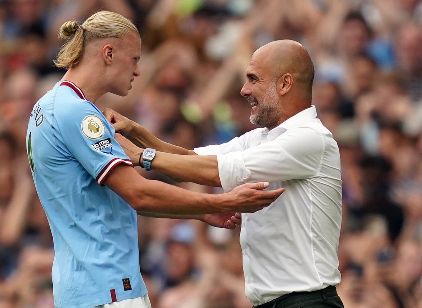 Pep Guardiola (right) has tried to downplay expectations of Erling Haaland (left) in the Champions League (Nick Potts/PA)