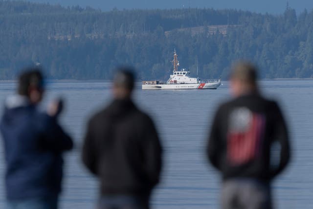 <p>A US Coast Guard vessel searches the area, Monday, Sept. 5, 2022, near Freeland, Wash., on Whidbey Island north of Seattle where a chartered floatplane crashed the day before. The plane was en route from Friday Harbor to Renton, Washington (AP Photo/Stephen Brashear)</p>