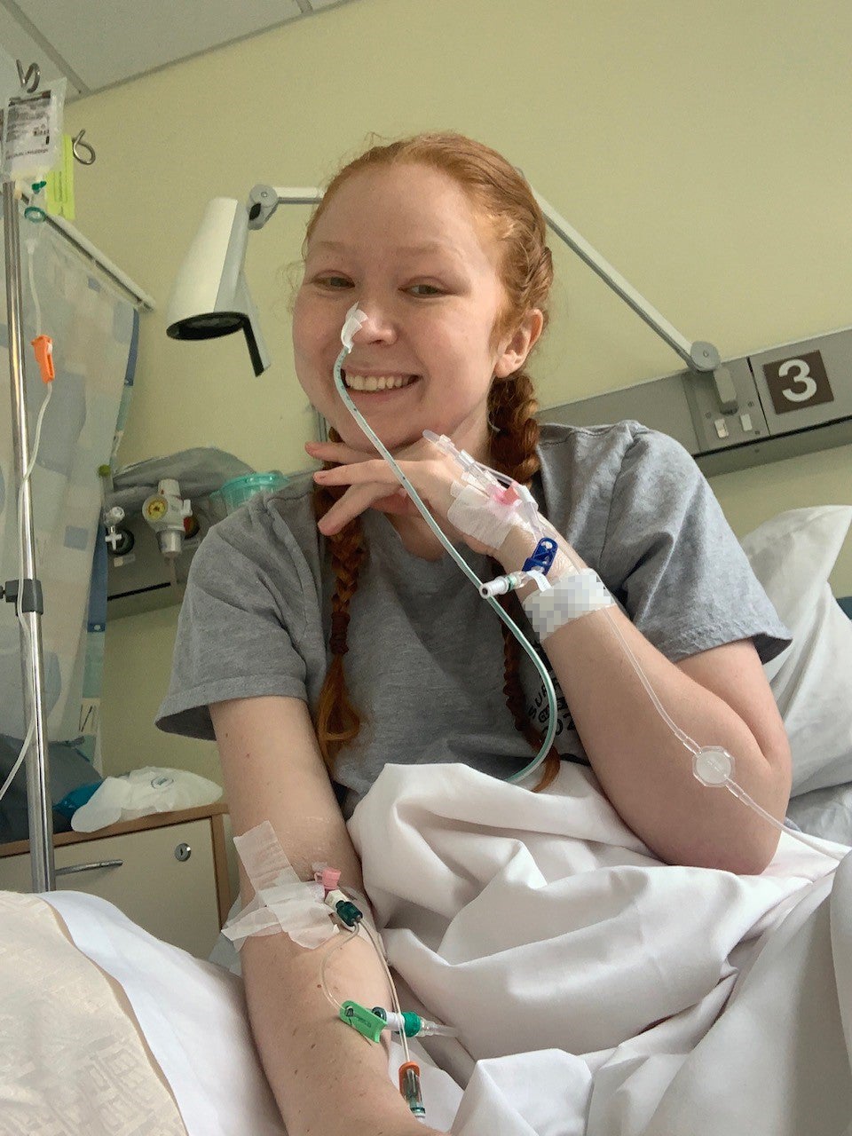 Young woman wearing ileostomy bag - Stock Image - C023/8604