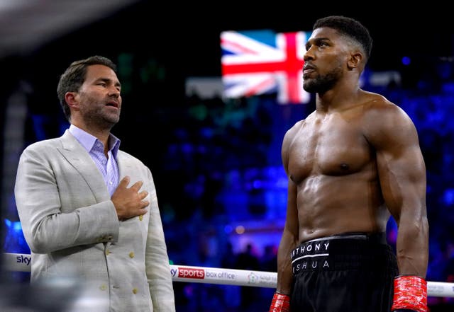 Promoter Eddie Hearn (left) would welcome the chance for Anthony Joshua (right) to face British rival Tyson Fury (Nick Potts/PA)