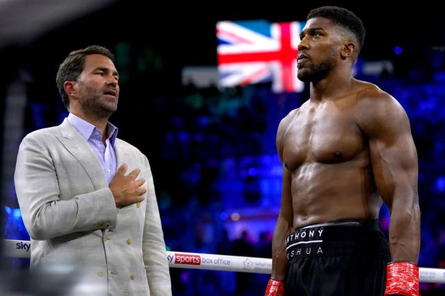 Promoter Eddie Hearn (left) would welcome the chance for Anthony Joshua (right) to face British rival Tyson Fury (Nick Potts/PA)