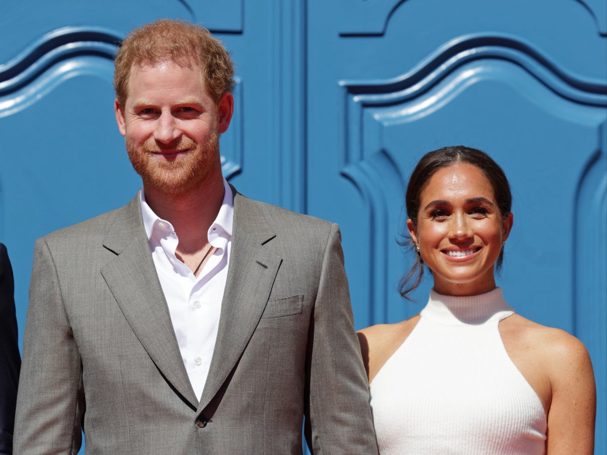 German crowds cheer for Prince Harry and Meghan Markle as they arrive for red carpet Invictus Games event