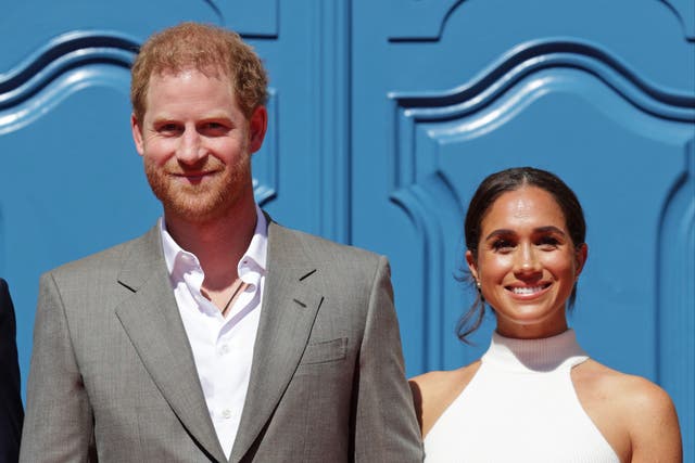 <p>Prince Harry and Meghan Markle arrive at town hall in Dusseldorf, Germany</p>