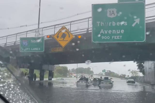 <p>Vehicles submerged on the I-95 in Rhode Island after intense rainfall</p>