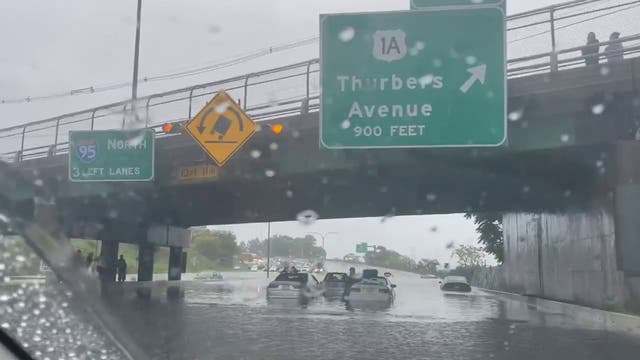 <p>Vehicles submerged on the I-95 in Rhode Island after intense rainfall</p>