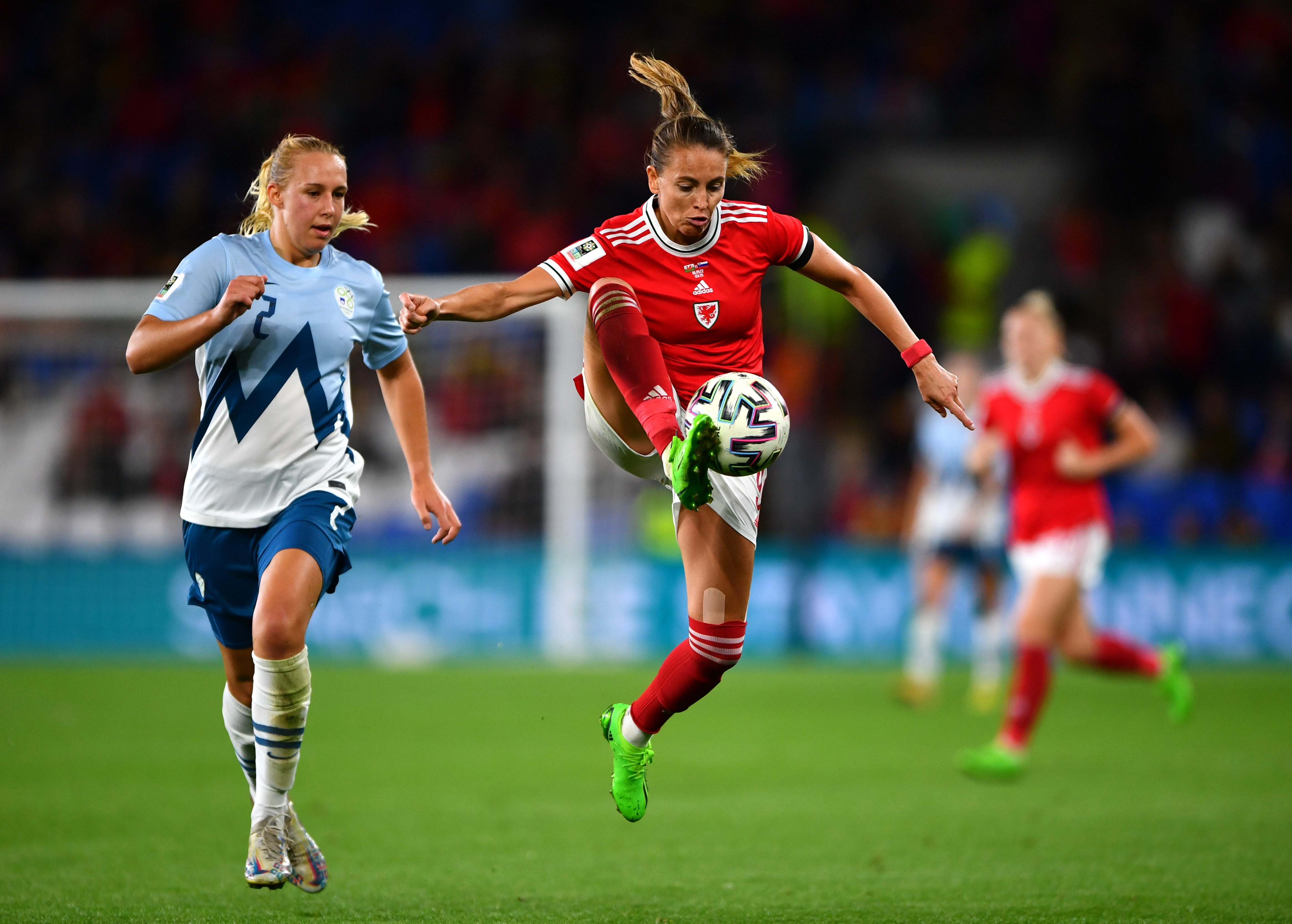 Wales’ Kayleigh Green (right) and Slovenia’s Lana Golob battle for possession in their goalless World Cup qualifier in Cardiff (Simon Galloway/PA)