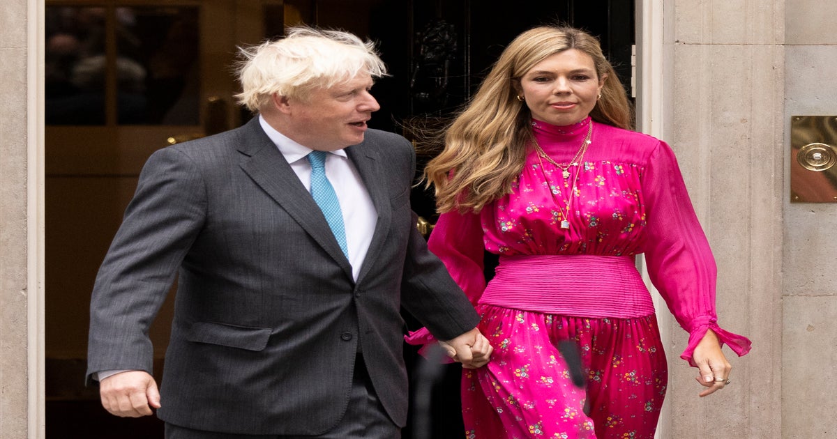 carrie johnson pink dress Boris Johnson's girlfriend Carrie Symonds wears 85 fuchsia dress from &  Other Stories | London Evening Standard