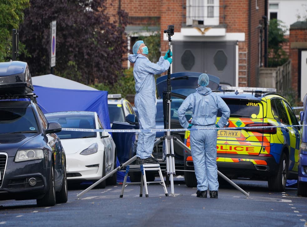 <p>Forensic teams were working at the scene in Streatham Hill on Tuesday (Jonathan Brady/PA)</p>