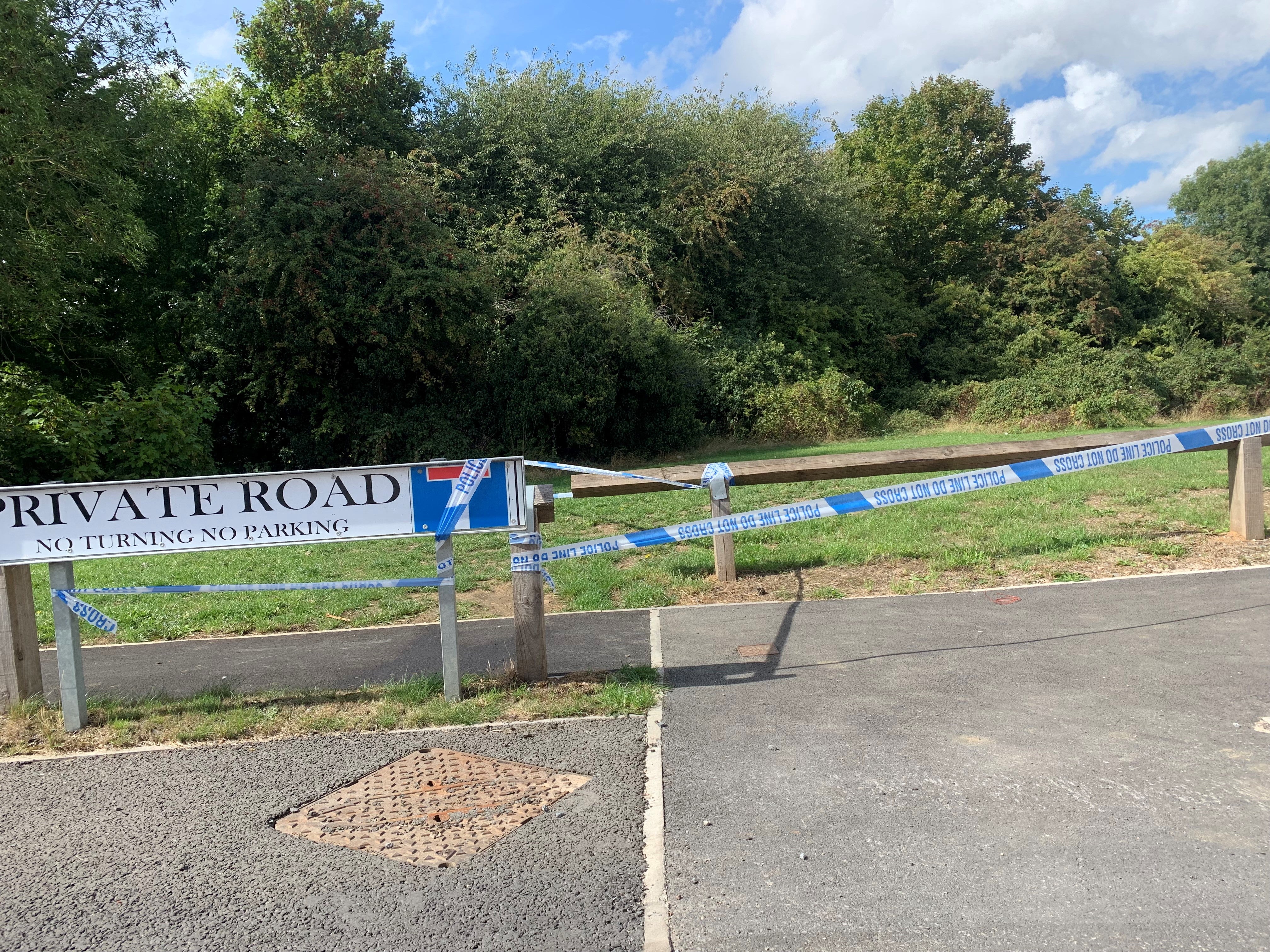 An area of land nearby had been cordoned off with police tape (Josh Payne/PA)