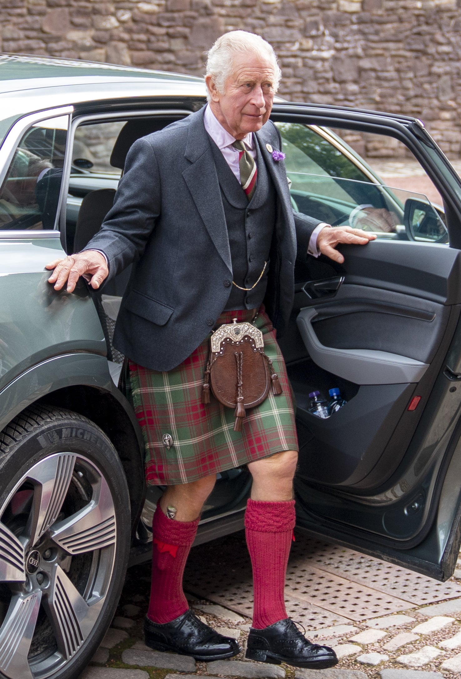 Charles wore a kit in Hunting Rothesay tartan for his visit (Jane Barlow/PA)