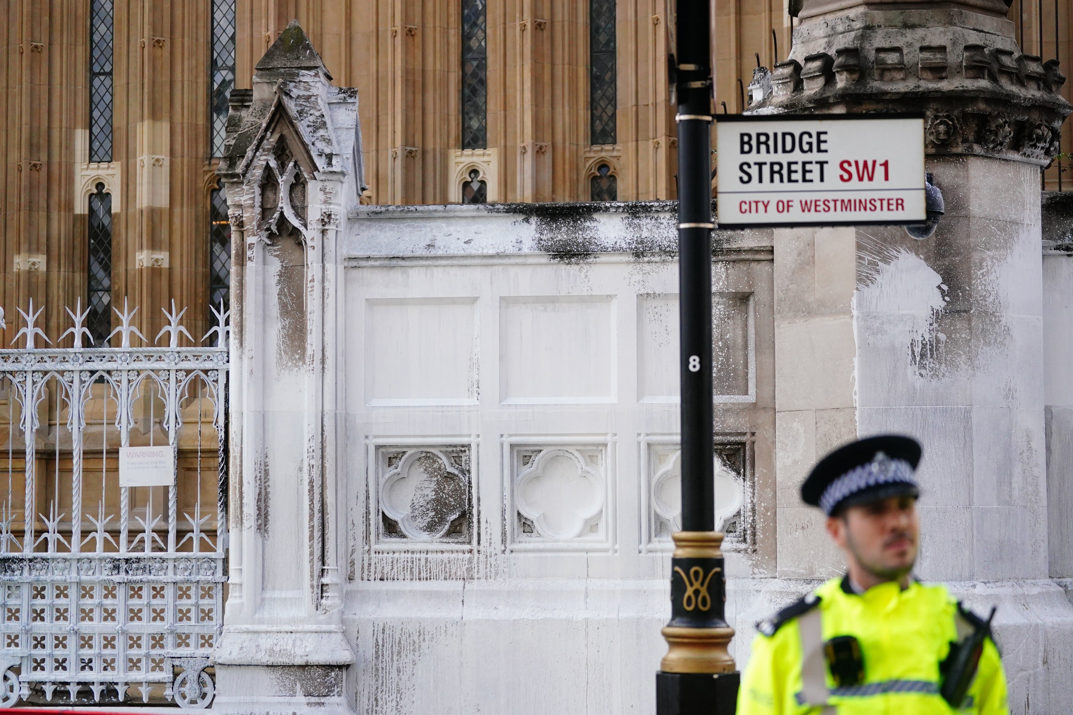 Paint covered walls outside the Houses of Parliament