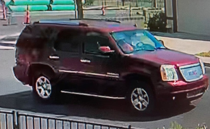 Investigators said they were looking for a 2007 to 2014 red or maroon GMC Yukon Denali vehicle in connection with the killing